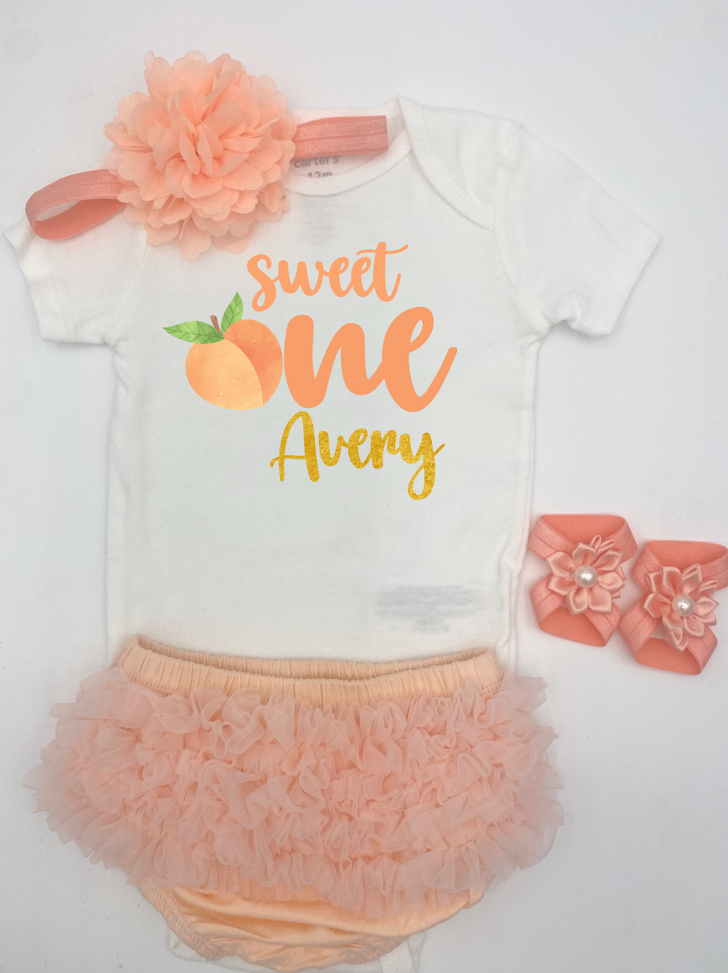 Peach One Birthday outfit.